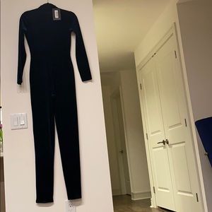 Green jumpsuit long sleeve. Never worn with tags